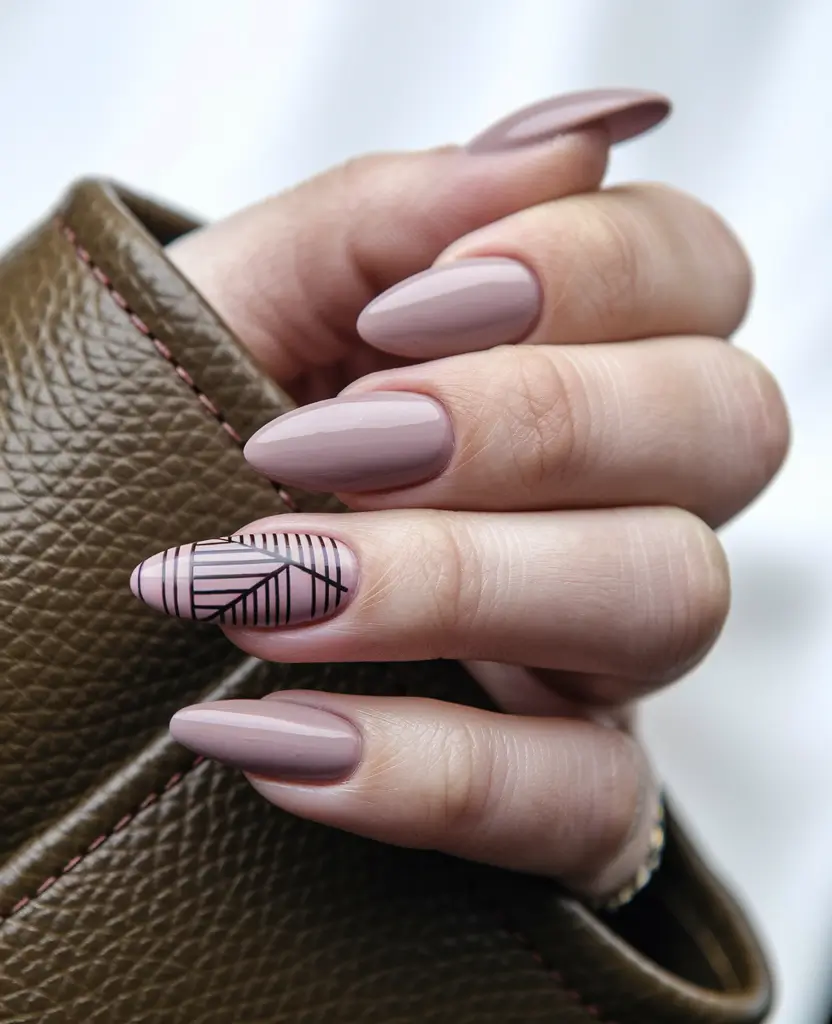 minimalist fall nails – Soft mauve almonds with leafy linework