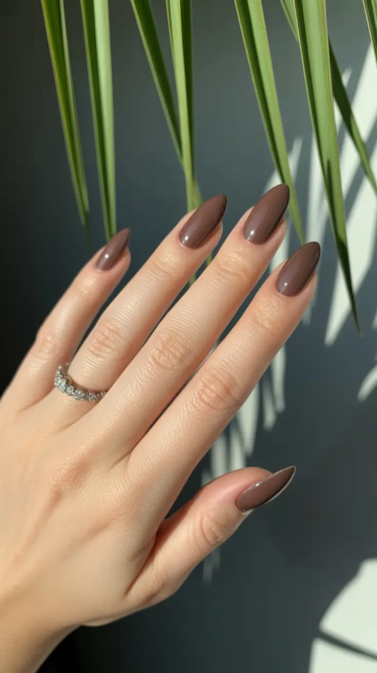 Fall Nail Color Inspo for October 2025 - Glossy Mocha Almonds - Caramel-Lit Neutral