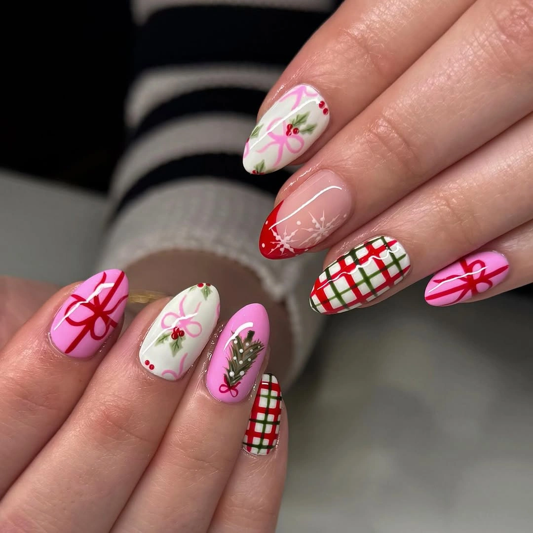 Almond nails with pink bows, red green plaid and holiday greenery